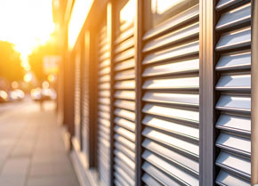 Engineer performing emergency roller shutter repair